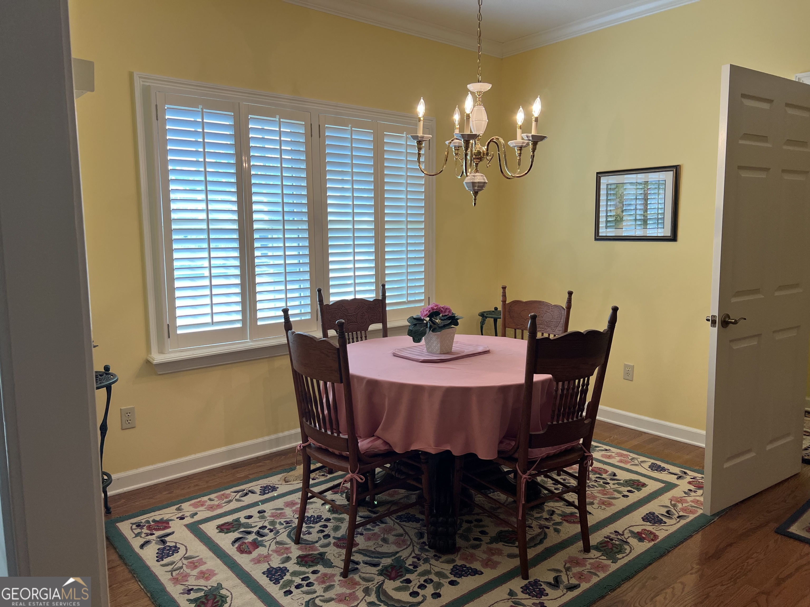 762 Nicholson-Carr Road Chester, GA 31012 - Photo 9 of 80 a view of a dining room with furniture and chandelier