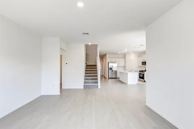 a view of a big room with closet and cabinet