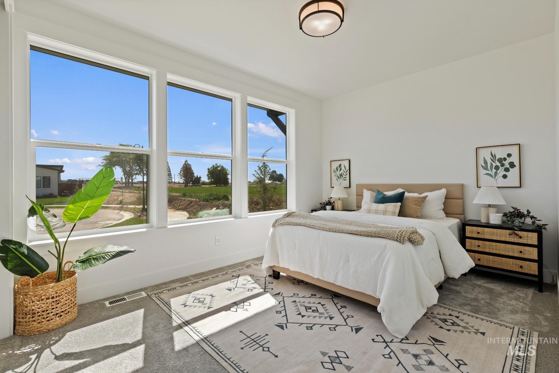 8650 West Inspirado Street Meridian, ID 83646 - Photo 24 of 30 Bedroom featuring baseboards