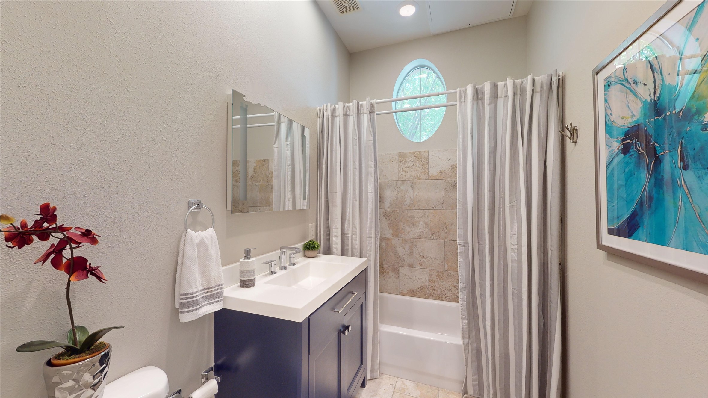2918 Ranch Road 620, Unit 297 Austin, TX 78734 - Photo 7 of 37 Full bath with vanity, shower / bath combo, and recessed lighting