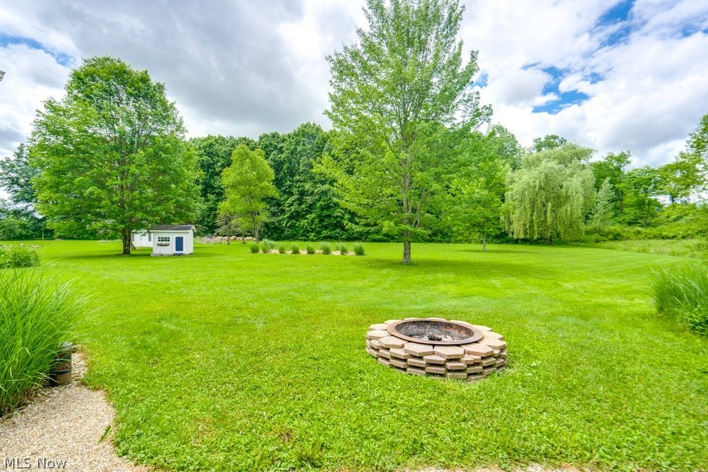 531 Porter Road Atwater, OH 44201 - Photo 6 of 44 View of yard with a fire pit