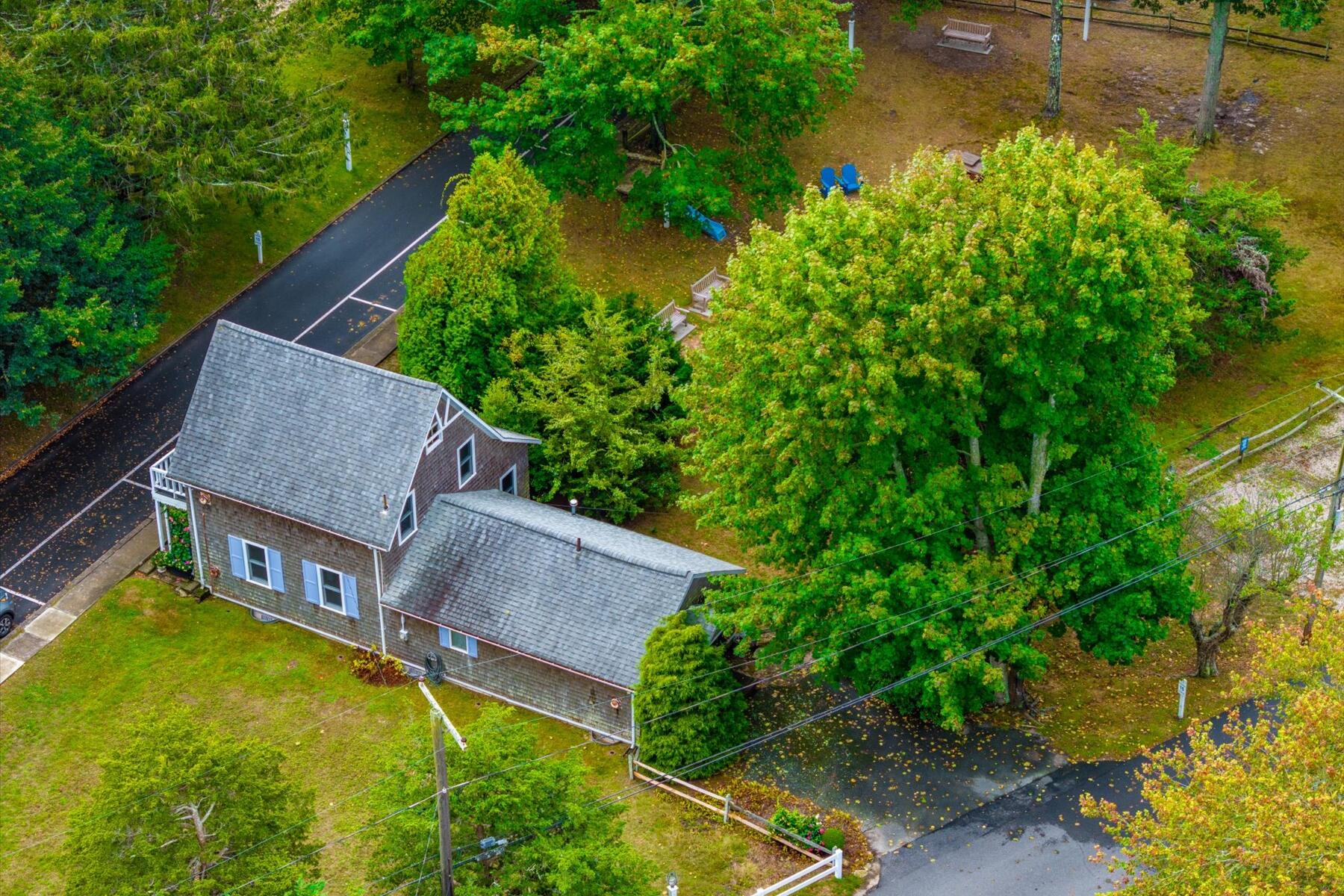 35 Valley Avenue Centerville, MA 02632 - Photo 27 of 37 a aerial view of a house with swimming pool and garden
