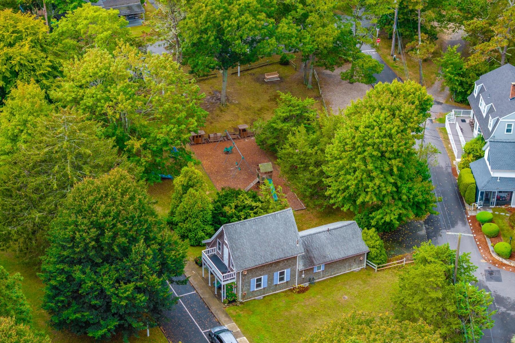 35 Valley Avenue Centerville, MA 02632 - Photo 32 of 37 an aerial view of a house with swimming pool and garden