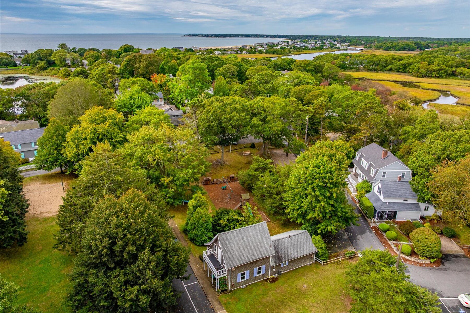 35 Valley Avenue Centerville, MA 02632 - Photo 34 of 37 an aerial view of a house with a garden and lake view