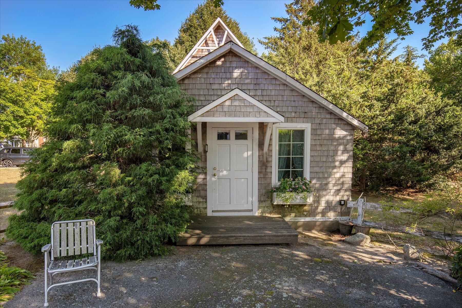 35 Valley Avenue Centerville, MA 02632 - Photo 5 of 37 a front view of a house with a yard