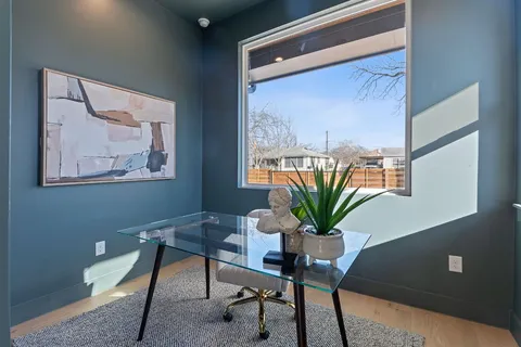 a view of a workspace with furniture