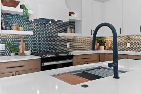 a bathroom with a sink and a mirror