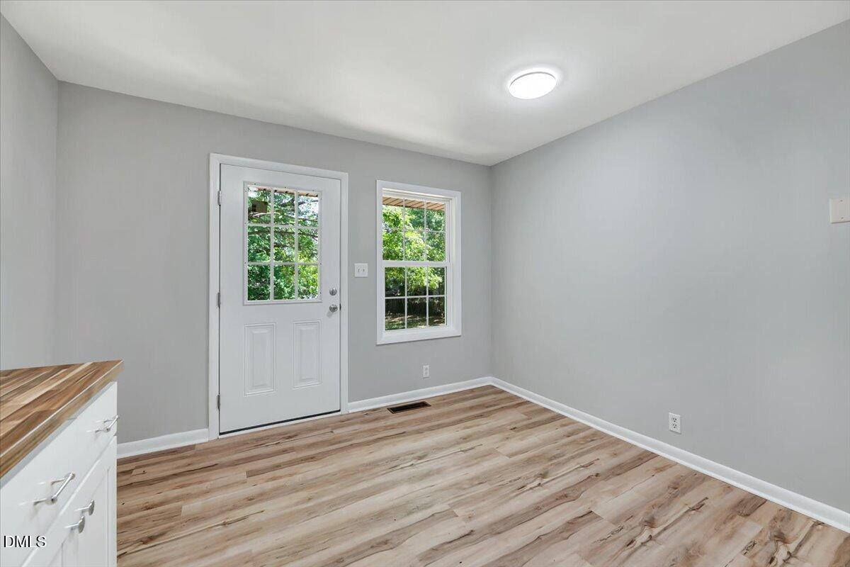 3408 Atlantic Avenue Raleigh, NC 27604 - Photo 14 of 48 a view of a room that has a window in it