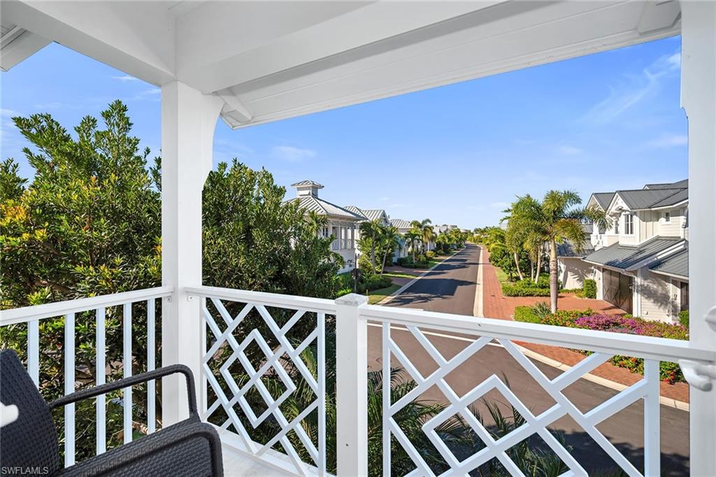 185 15th Street South Naples, FL 34102 - Photo 24 of 49 a view of a balcony with chairs