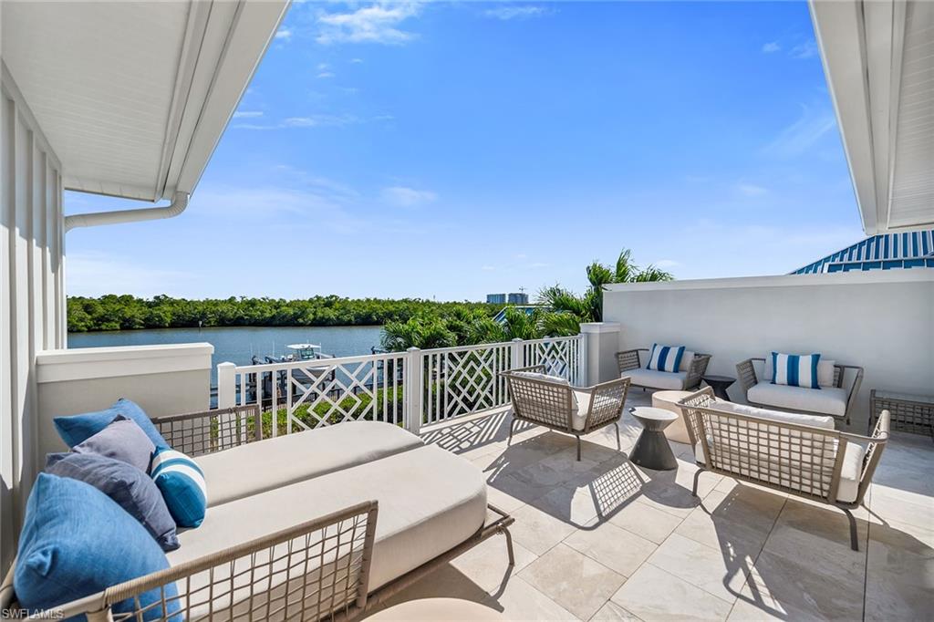 185 15th Street South Naples, FL 34102 - Photo 34 of 49 a view of balcony with furniture