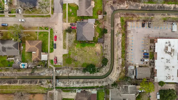 front view of a house with a fountain