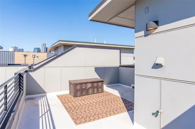 a view of a hallway with seating area