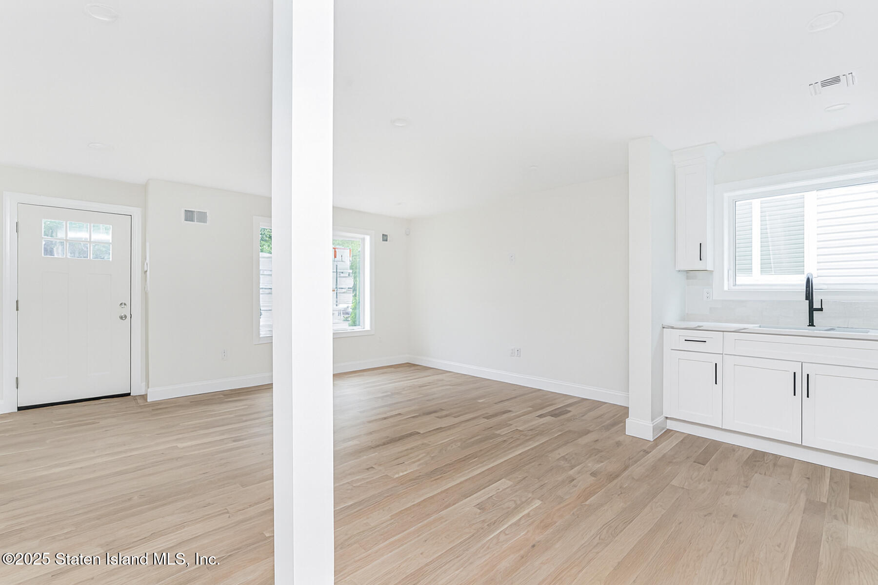 670 Arden Avenue Staten Island, NY 10312 - Photo 8 of 50 08 - Kitchen + living room + Dining angl