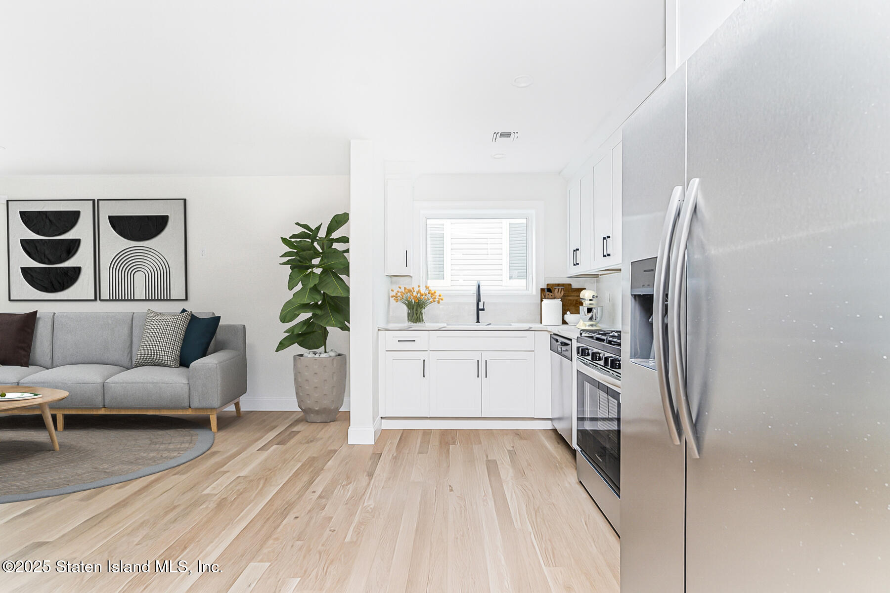 670 Arden Avenue Staten Island, NY 10312 - Photo 9 of 50 09 - Kitchen + living room + Dining angl