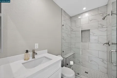 a view of a house with backyard and a garden