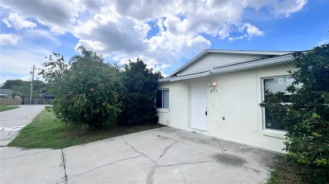 a house with trees in front of it