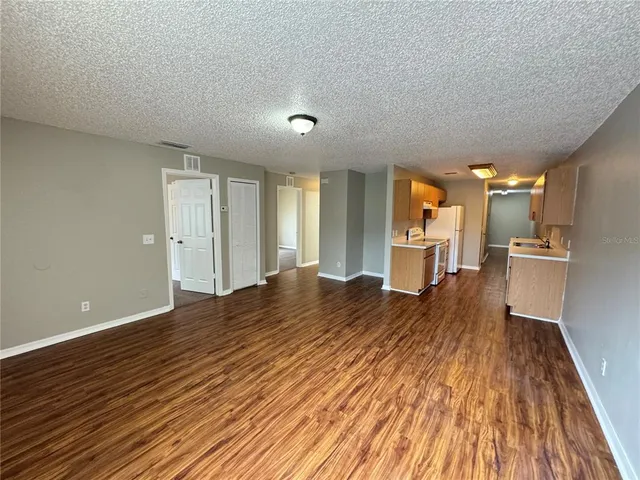 a bedroom with a bed and closet