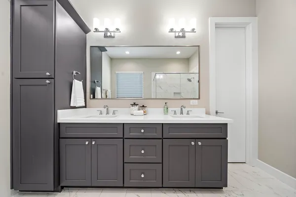 a bathroom with a bathtub and a sink