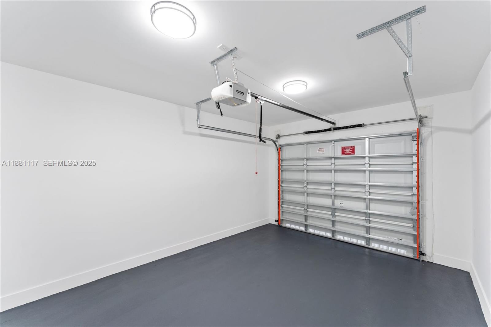 1556 Northwest 68th Terrace Miami, FL 33147 - Photo 13 of 14 a view of a garage