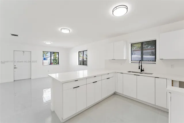 a view of a room with sliding glass door