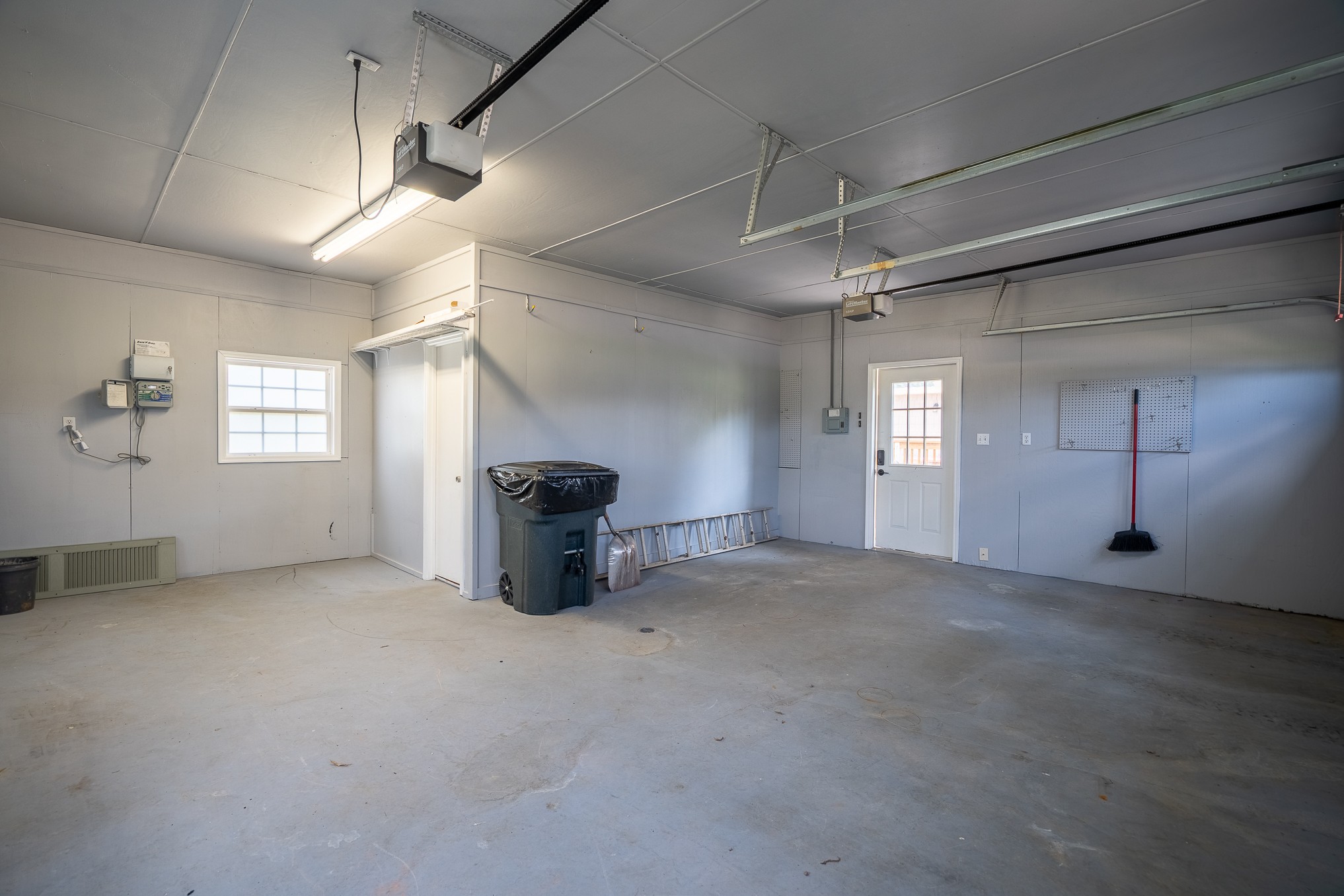 26 Barns Road Leoma, TN 38468 - Photo 19 of 55 en empty room with windows and fireplace