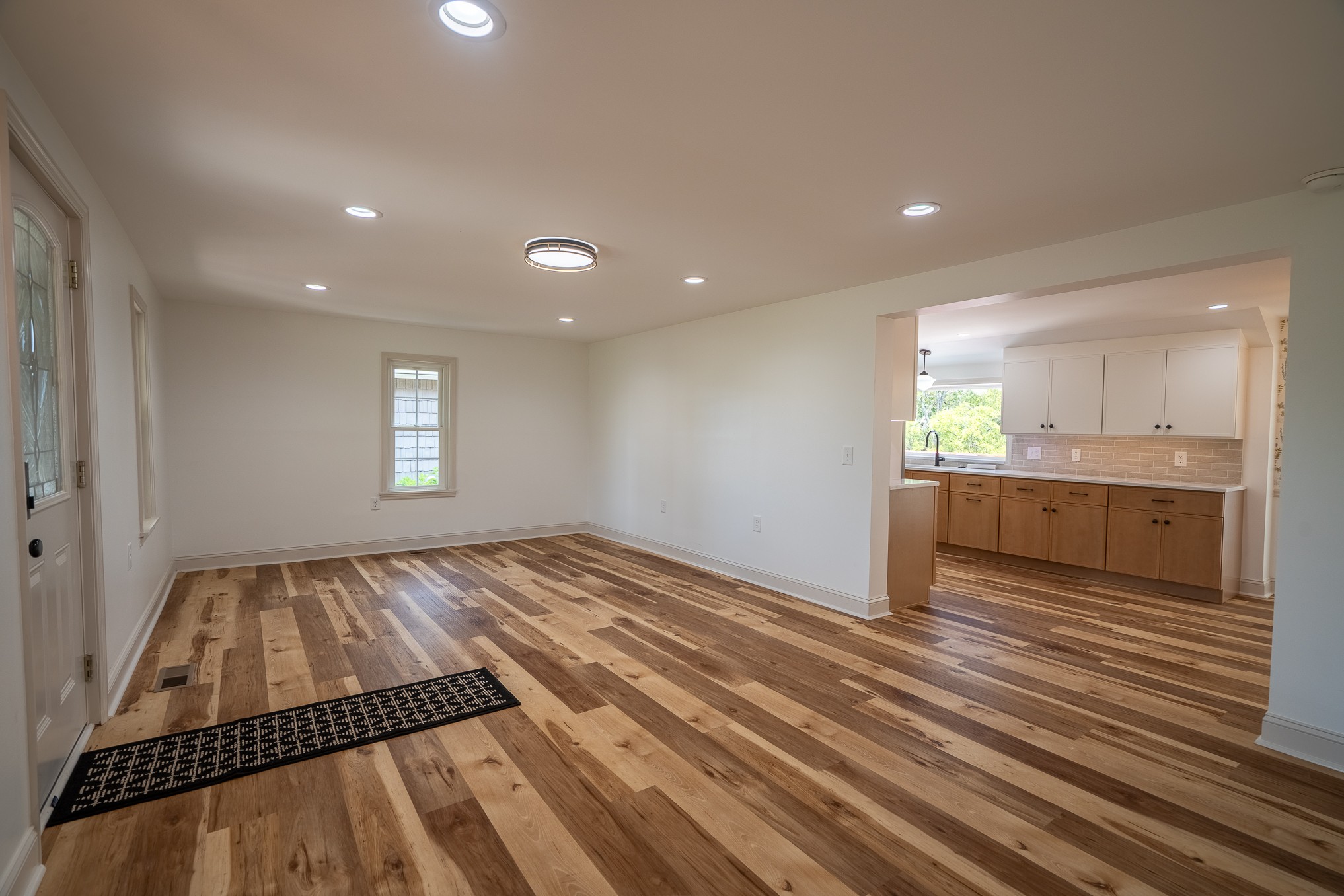 26 Barns Road Leoma, TN 38468 - Photo 22 of 55 a view of kitchen and empty room with wooden floor