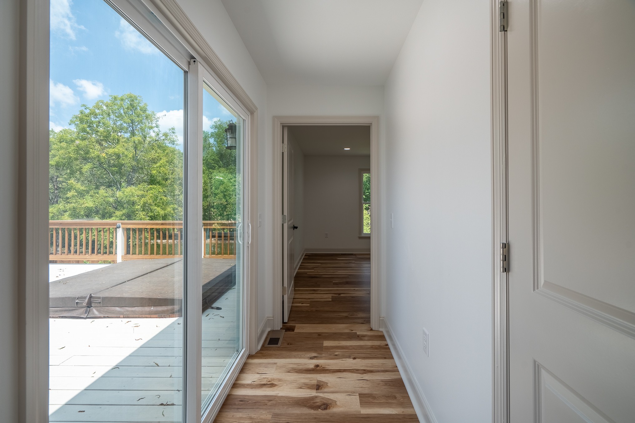26 Barns Road Leoma, TN 38468 - Photo 32 of 55 a view of a hallway with wooden floor and stairs