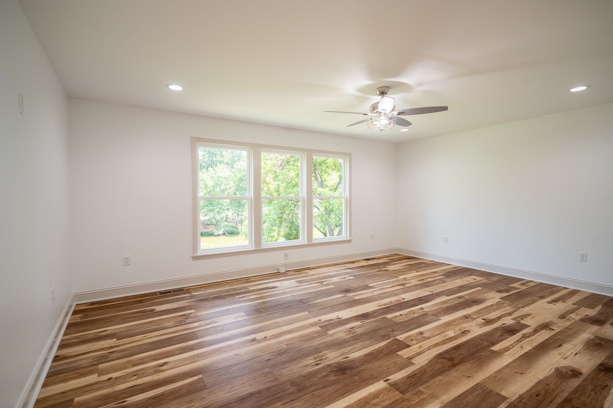26 Barns Road Leoma, TN 38468 - Photo 33 of 55 a view of a room with a ceiling fan and a window