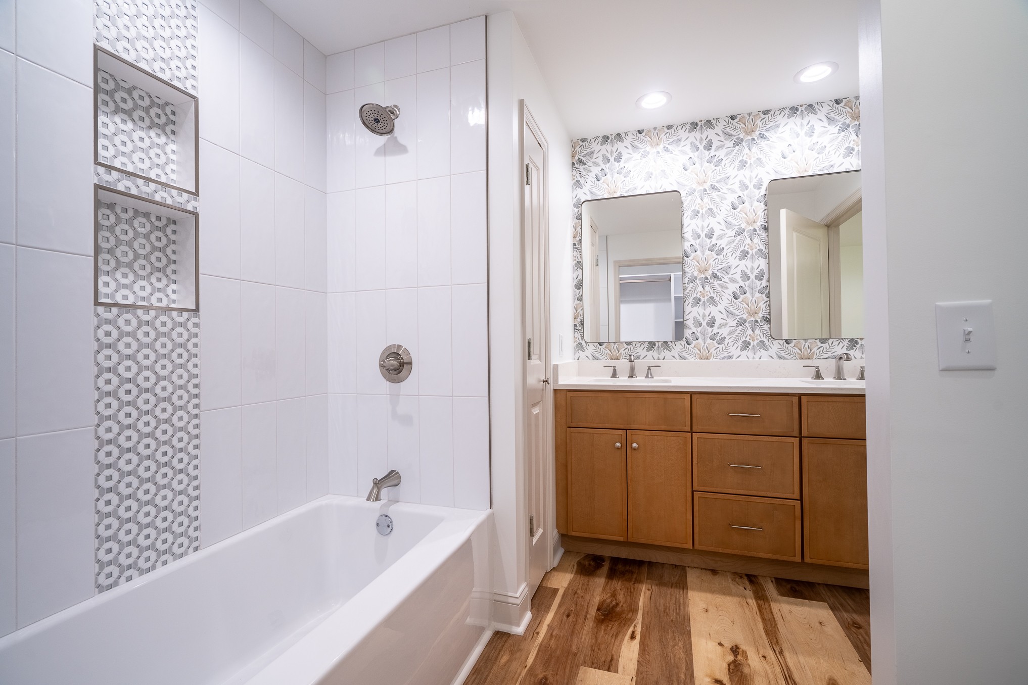 26 Barns Road Leoma, TN 38468 - Photo 41 of 55 a bathroom with a tub a sink and mirrors