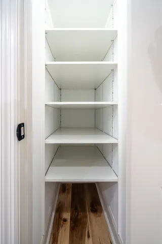 a view of walk in closet with window