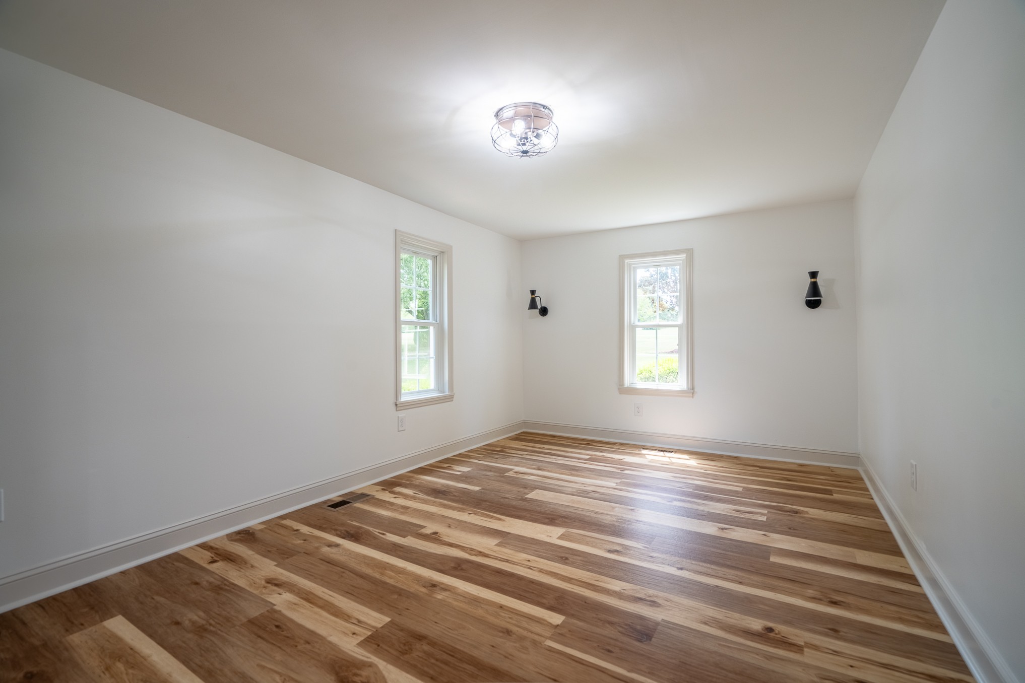26 Barns Road Leoma, TN 38468 - Photo 46 of 55 a view of an empty room with window and hardwood floor