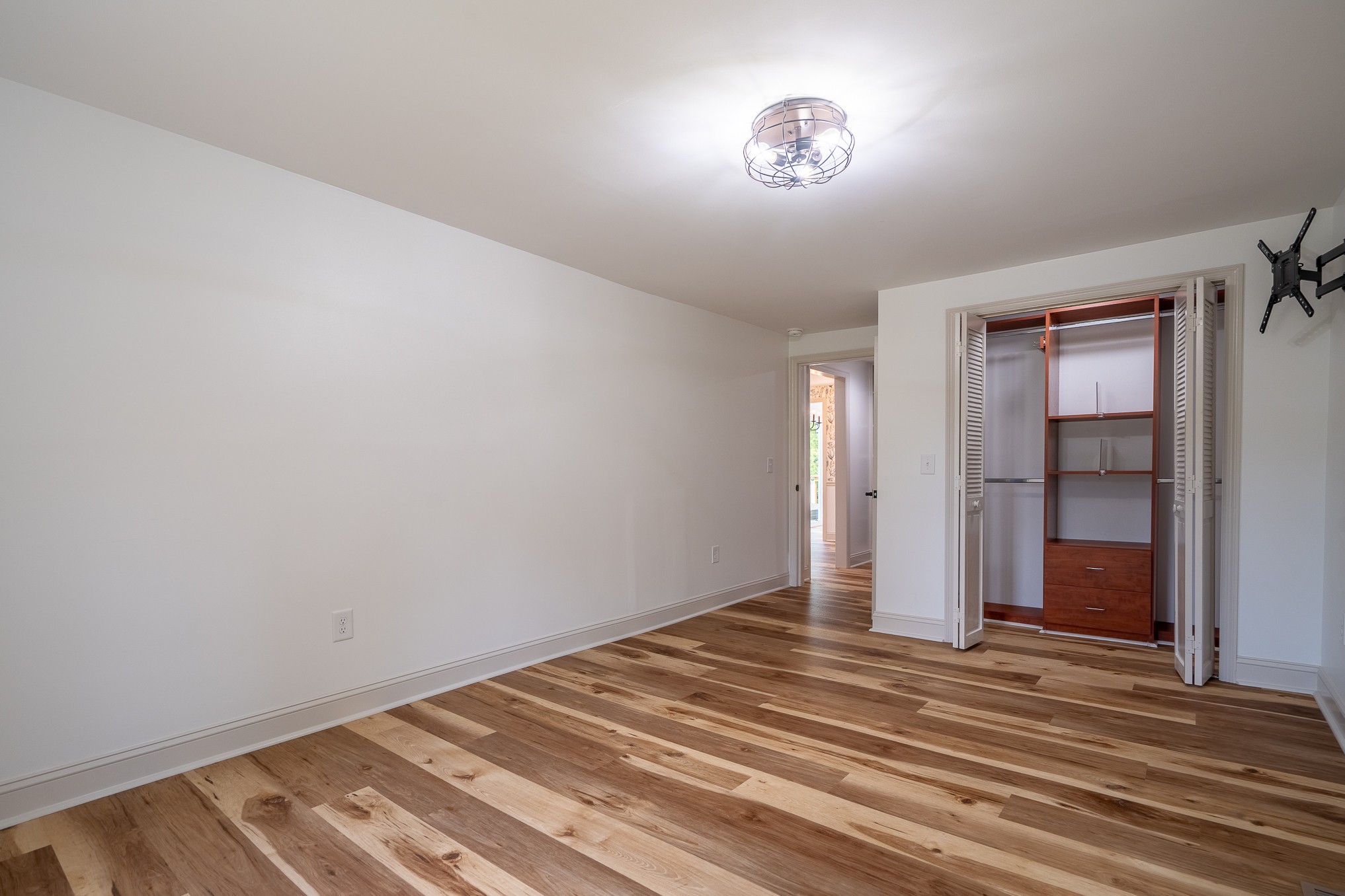 26 Barns Road Leoma, TN 38468 - Photo 48 of 55 a view of a room with wooden floor and closet