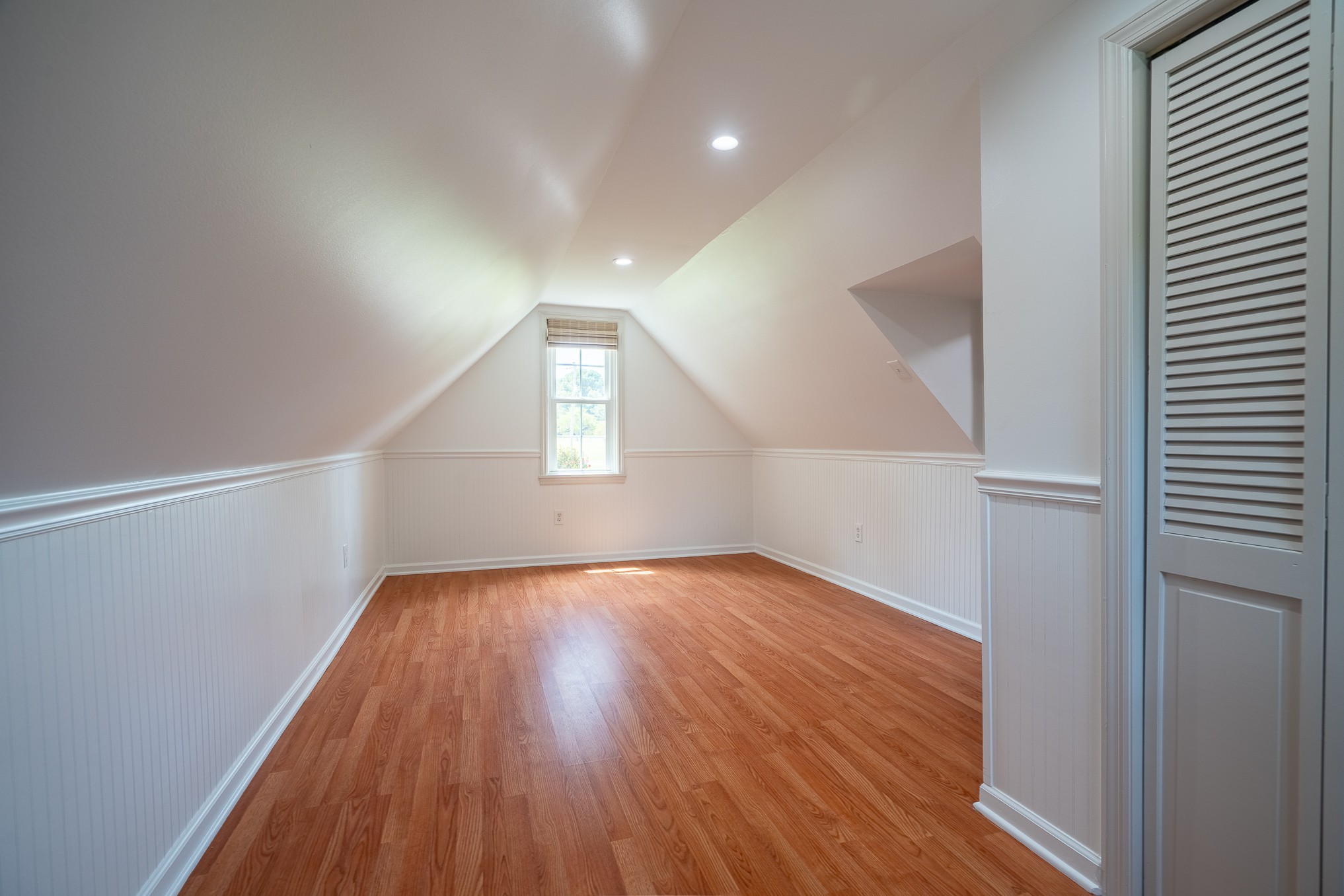 26 Barns Road Leoma, TN 38468 - Photo 52 of 55 a view of an empty room with wooden floor and a window