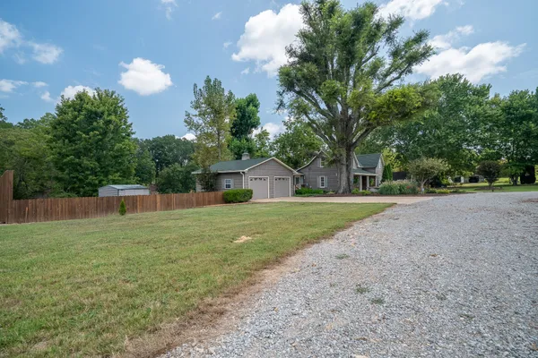 a house view with a garden space