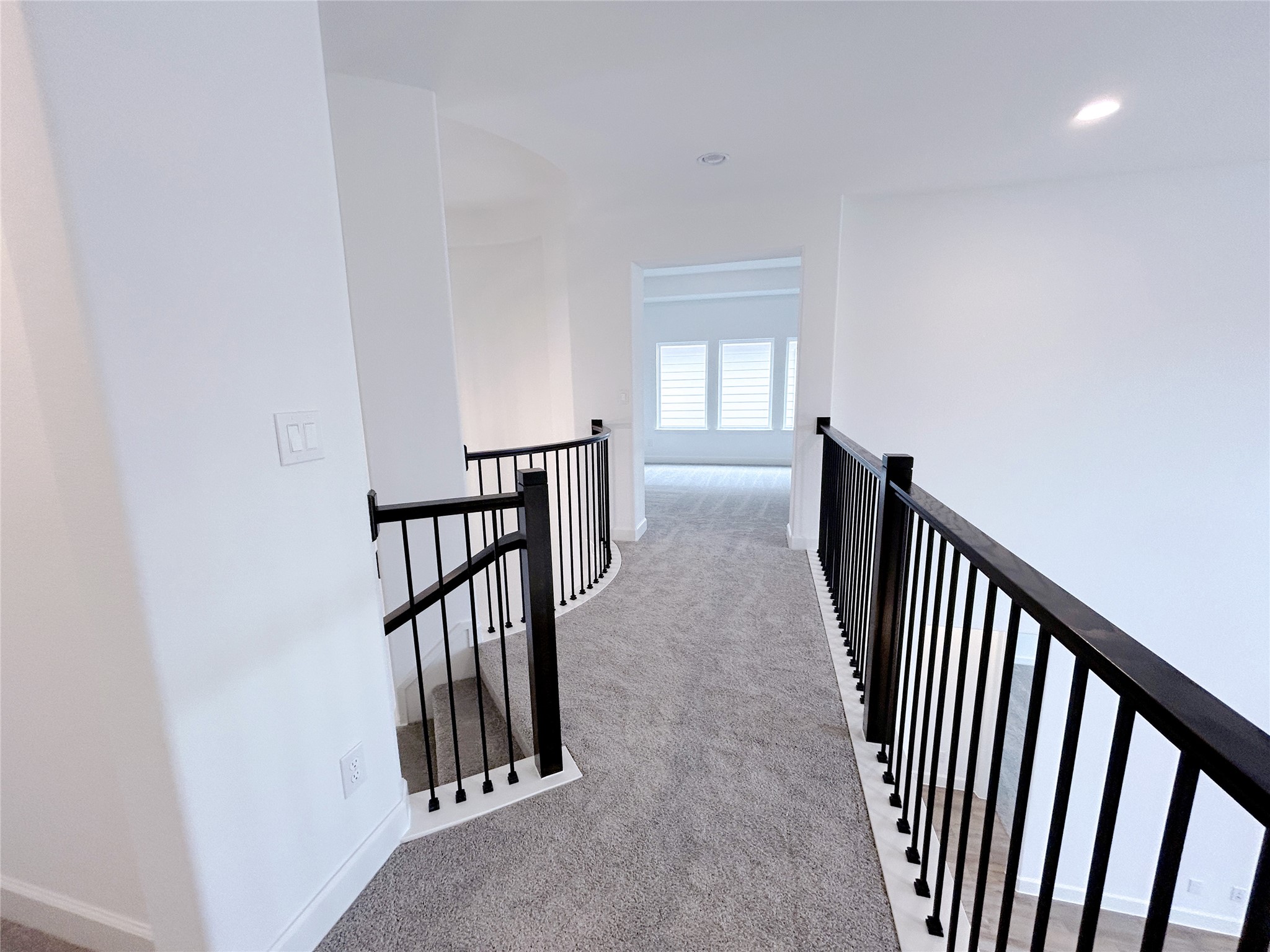 29847 Longleaf Grv Lane Fulshear, TX 77441 - Photo 25 of 39 a view of a hallway with seating area
