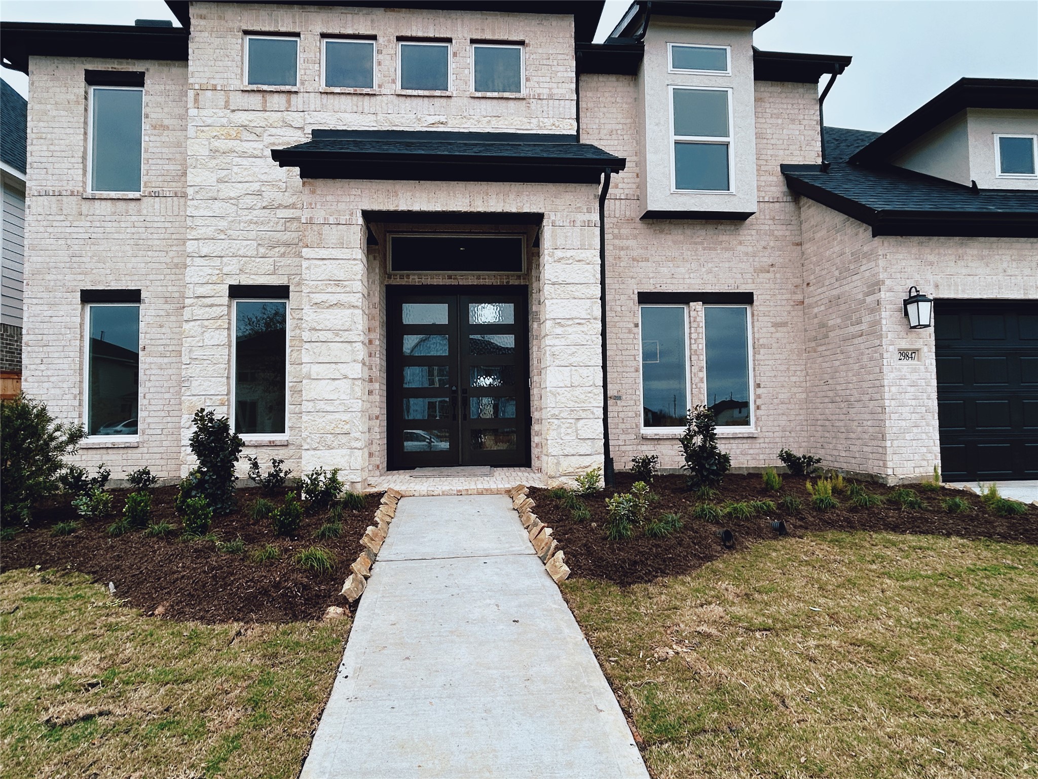 29847 Longleaf Grv Lane Fulshear, TX 77441 - Photo 3 of 39 a front view of a house