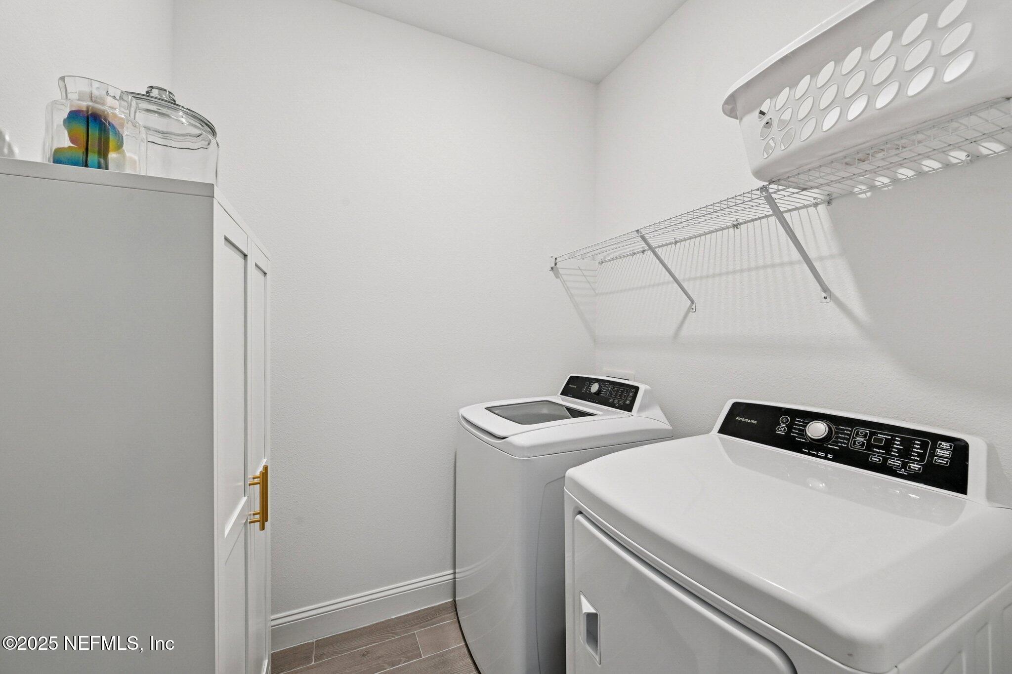 181 Varner Way St. Augustine, FL 32092 - Photo 16 of 27 a utility room with dryer and washer