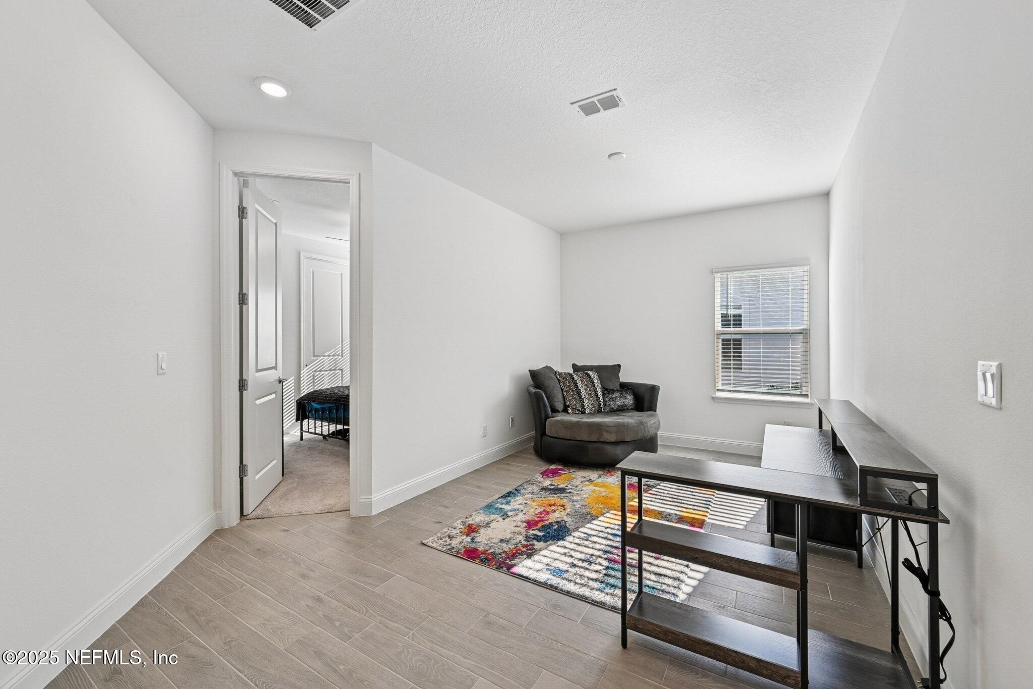181 Varner Way St. Augustine, FL 32092 - Photo 5 of 27 a living room with furniture