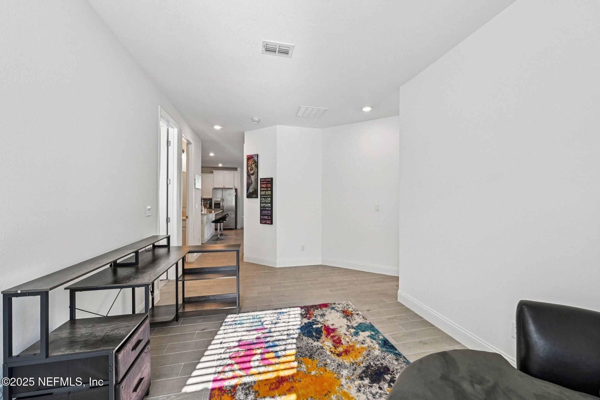 181 Varner Way St. Augustine, FL 32092 - Photo 6 of 27 a very nice looking room with a rug