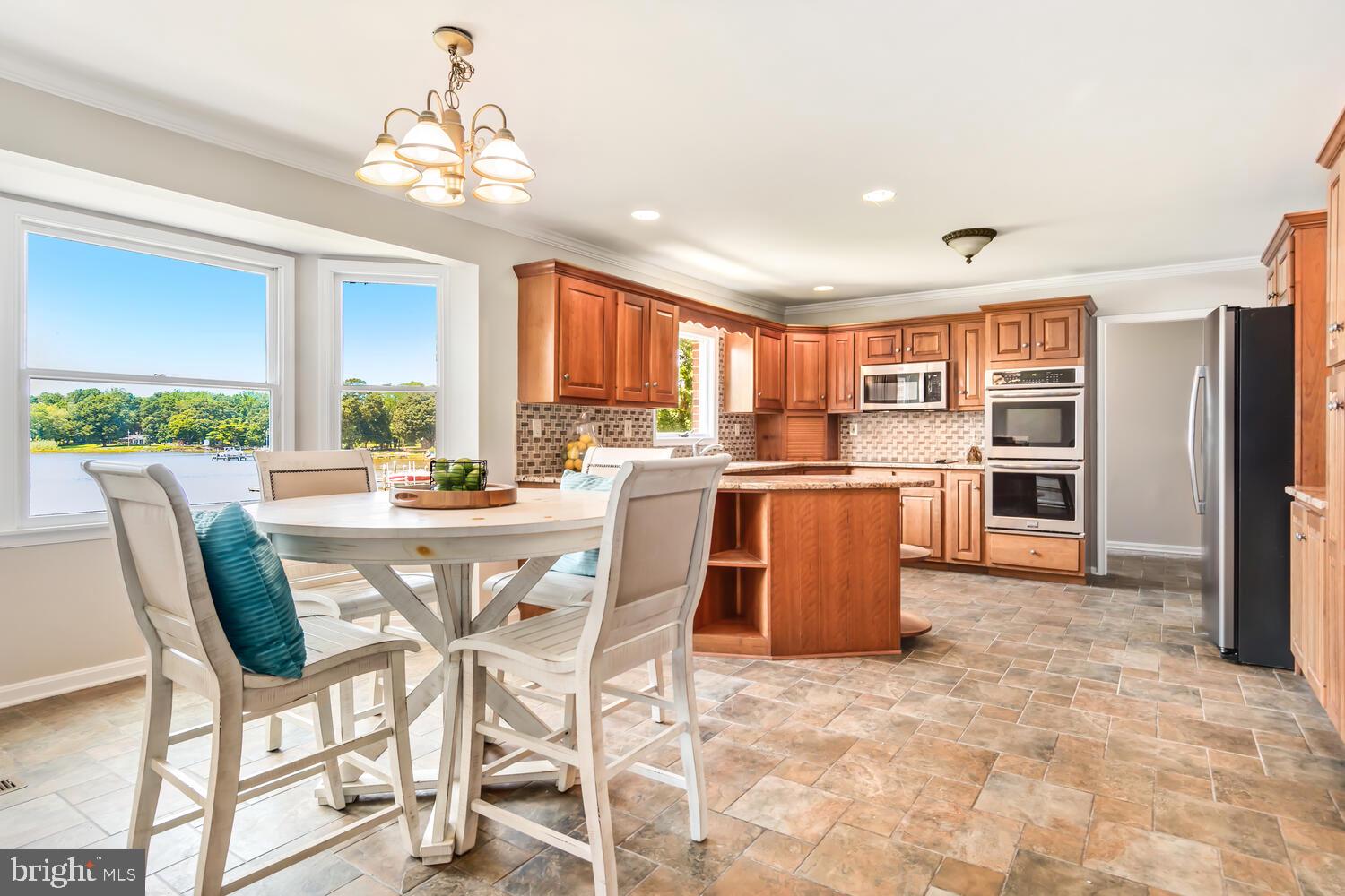 2408 Bennett Point Road Queenstown, MD 21658 - Photo 10 of 49 Breakfast Room & Kitchen
