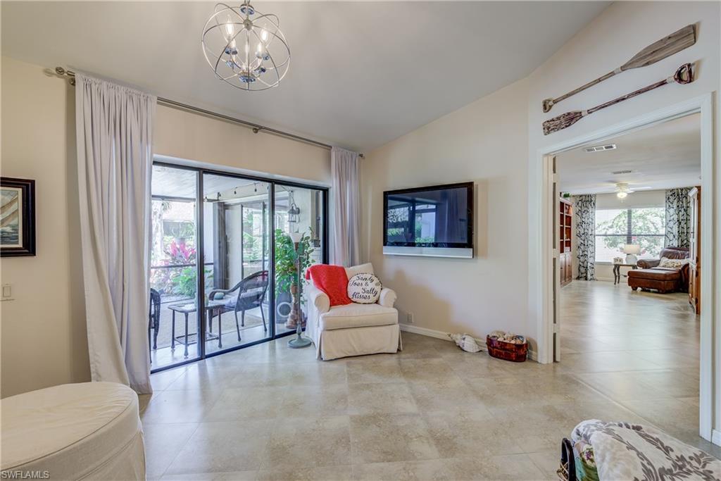 13214 Heather Ridge Loop Fort Myers, FL 33966 - Photo 13 of 26 Family Room with views of Lanai, Courtyard, Entry Way and Reading Room