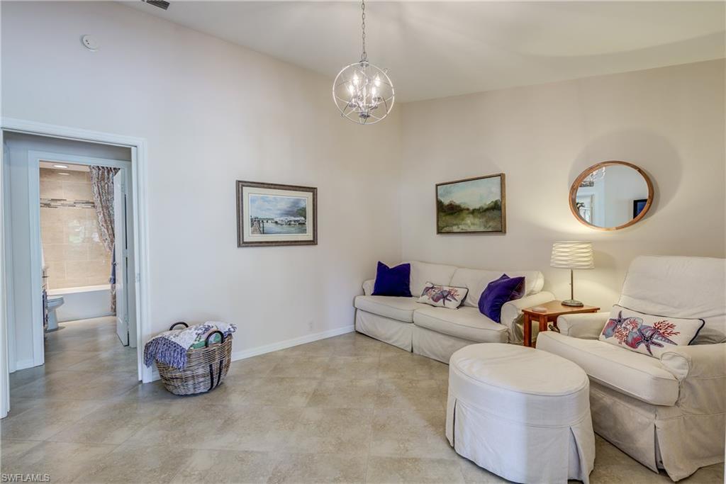13214 Heather Ridge Loop Fort Myers, FL 33966 - Photo 14 of 26 Family Room, Hallway, Guest Bath
