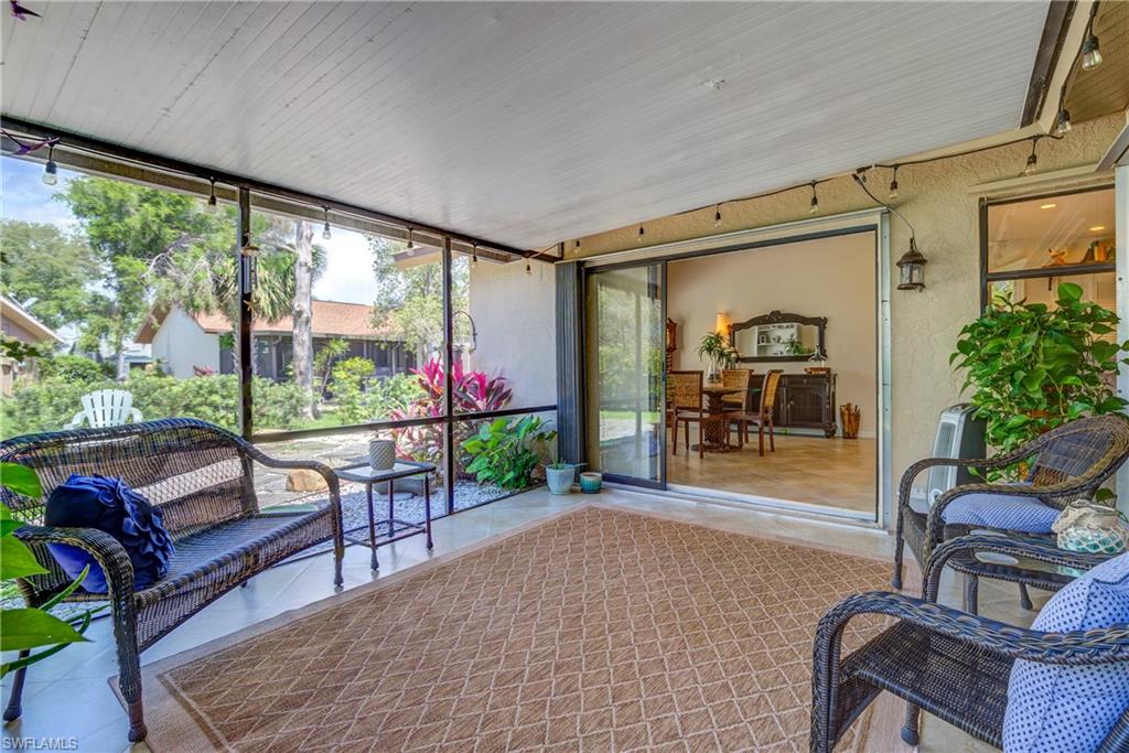 13214 Heather Ridge Loop Fort Myers, FL 33966 - Photo 22 of 26 Screened In Lanai with Courtyard View
