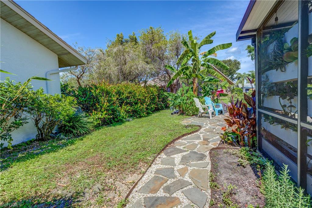 13214 Heather Ridge Loop Fort Myers, FL 33966 - Photo 23 of 26 Pathway to Courtyard