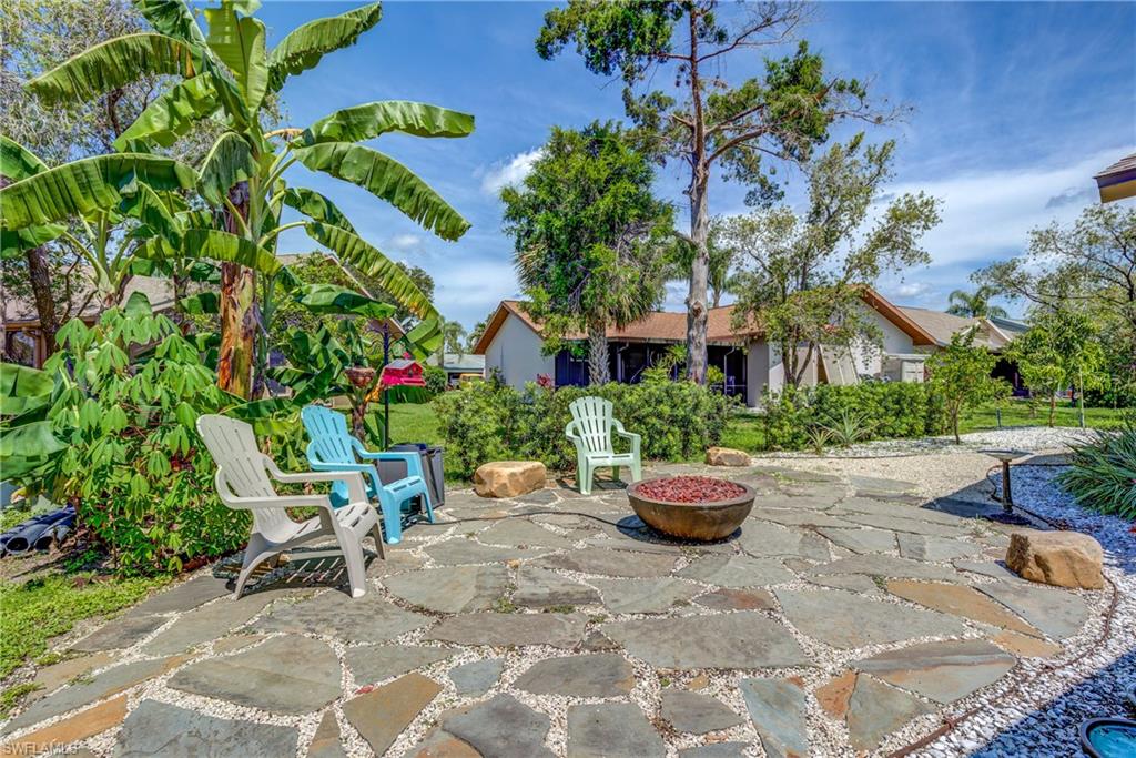 13214 Heather Ridge Loop Fort Myers, FL 33966 - Photo 24 of 26 Courtyard with Banana Trees, Tangelo Tree, Starfruit Tree, and Mango Tree.