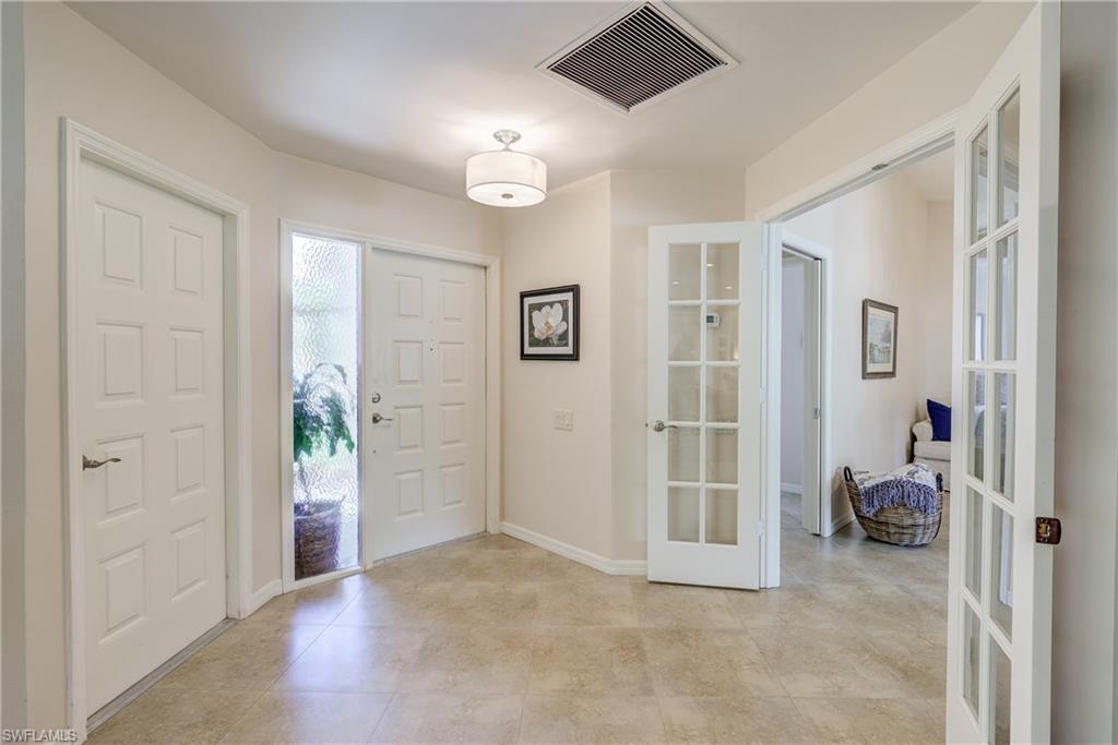 13214 Heather Ridge Loop Fort Myers, FL 33966 - Photo 5 of 26 Front Entry, Beautiful French Doors, Garage Door
