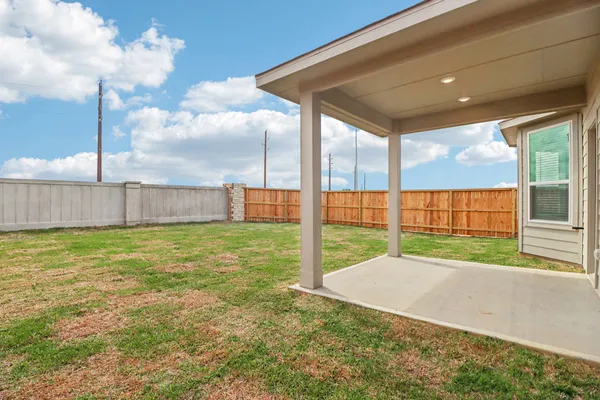a view of a backyard with a garden