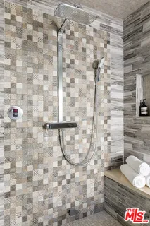 a patio with table and chairs