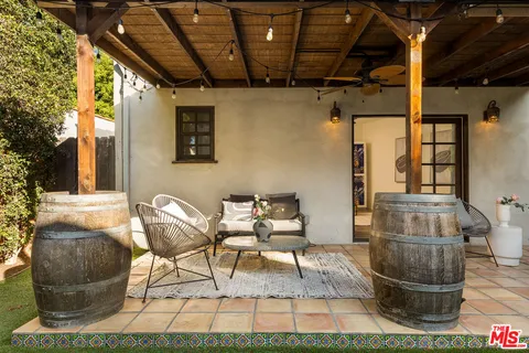 a view of hall way with furniture