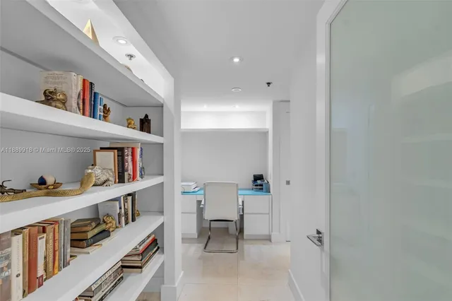 a room with furniture and a book shelf